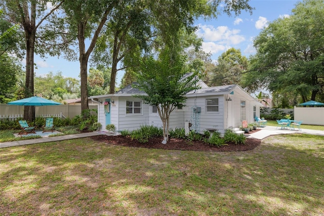 12335 SE 130th Ct, Ocklawaha, FL 32179 - view of front of house featuring a patio area