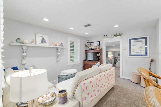 12335 SE 130th Ct, Ocklawaha, FL 32179 - carpeted living area with recessed lighting and baseboards