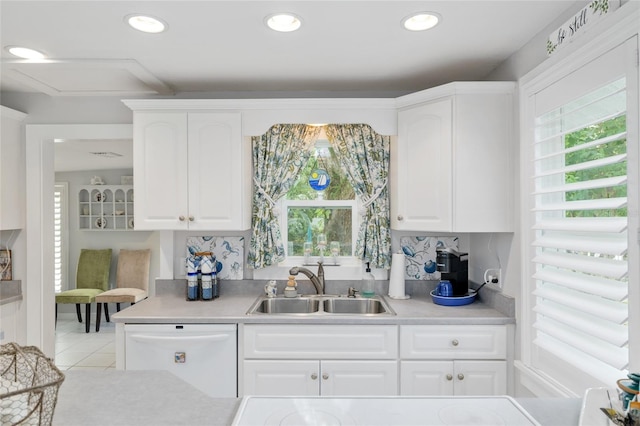 12335 SE 130th Ct, Ocklawaha, FL 32179 - kitchen featuring white dishwasher, a sink, healthy amount of natural light, light countertops, and recessed lighting