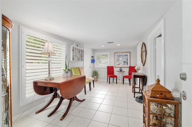 12335 SE 130th Ct, Ocklawaha, FL 32179 - entrance foyer featuring baseboards, light tile patterned floors, and recessed lighting