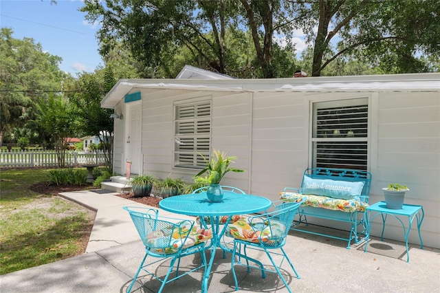 12335 SE 130th Ct, Ocklawaha, FL 32179 - view of patio / terrace with outdoor dining space