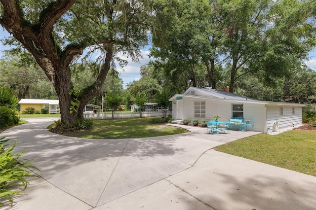 12335 SE 130th Ct, Ocklawaha, FL 32179 - view of yard with driveway and view of scattered trees
