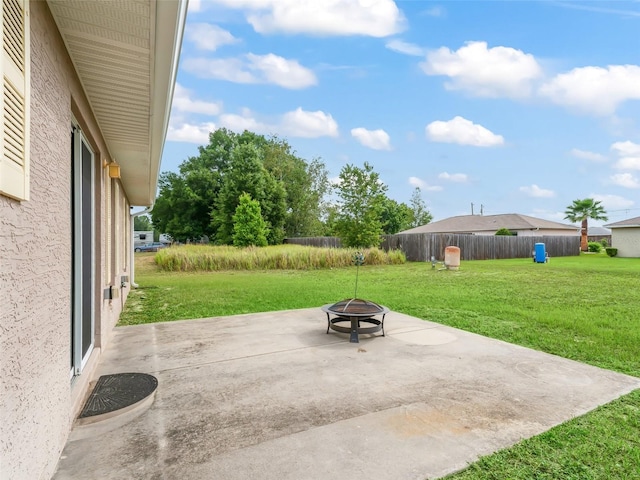 11 Pecan Course Loop, Ocala, FL 34472 - view of patio / terrace featuring a fire pit