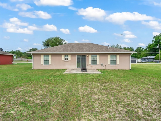 11 Pecan Course Loop, Ocala, FL 34472 - rear view of house with a patio, stucco siding, and a yard