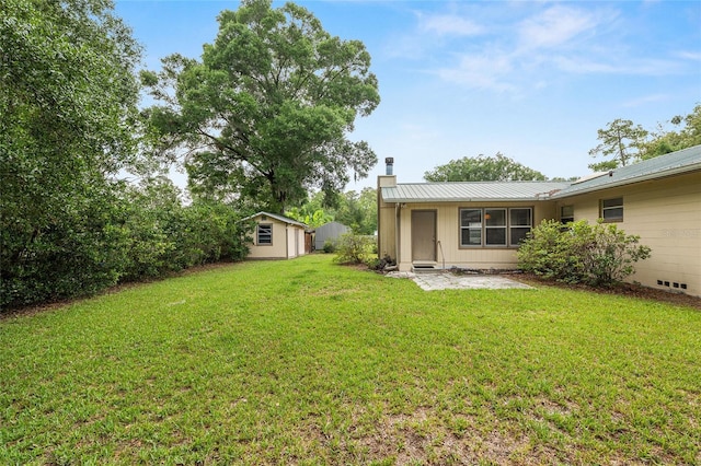 3621 SE 12th Pl, Ocala, FL 34471 - view of green lawn with a patio