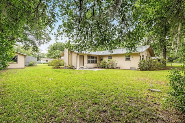 3621 SE 12th Pl, Ocala, FL 34471 - rear view of property featuring metal roof