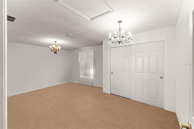 5445 NE Anthony Rd, Ocala, FL 34475 - unfurnished room with a chandelier, carpet, and baseboards