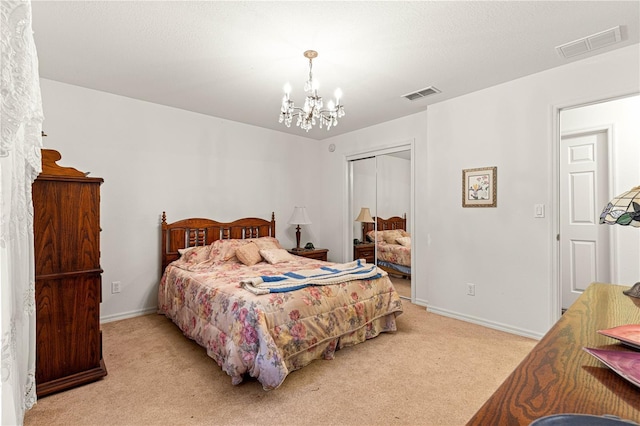 5445 NE Anthony Rd, Ocala, FL 34475 - bedroom featuring a chandelier, light colored carpet, a closet, and baseboards