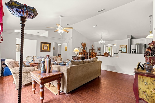 5445 NE Anthony Rd, Ocala, FL 34475 - living area with ceiling fan, wood finished floors, a chandelier, high vaulted ceiling, and baseboards