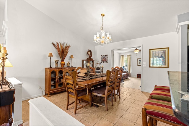 5445 NE Anthony Rd, Ocala, FL 34475 - dining space with a chandelier, light tile patterned floors, and baseboards