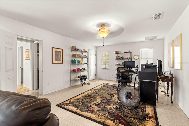 5445 NE Anthony Rd, Ocala, FL 34475 - home office with a ceiling fan and baseboards