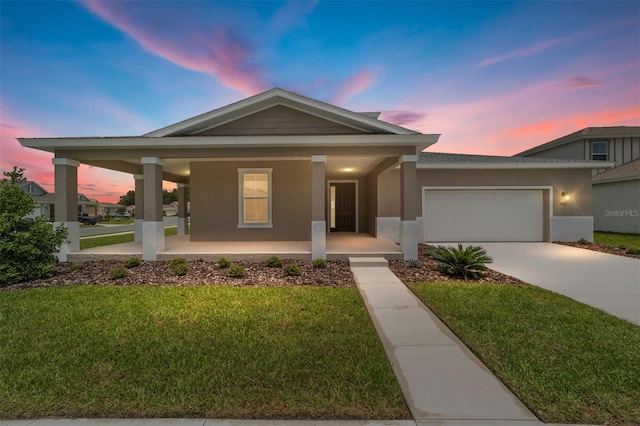 7745 SW 56th Pl, Ocala, FL 34474 - single story home with a porch, a garage, stucco siding, concrete driveway, and a yard