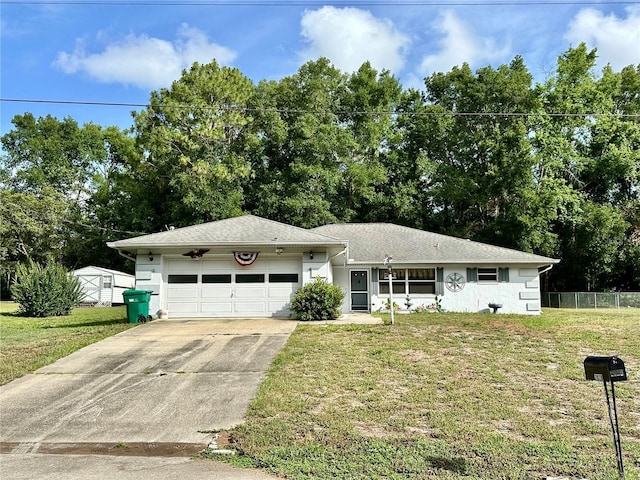 2020 W Snowy Egret Pl, Citrus Springs, FL 34434 - view of front of house with an attached garage, driveway, view of wooded area, and stucco siding