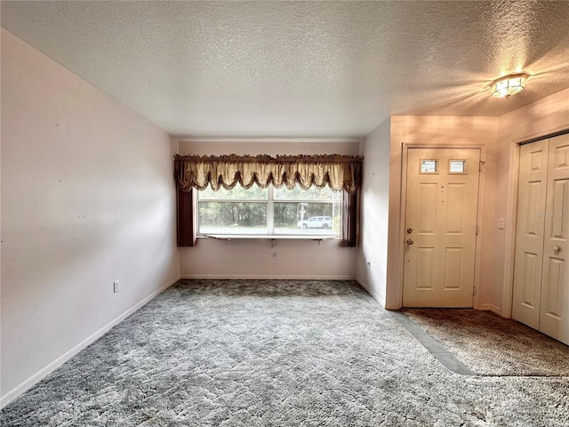 2020 W Snowy Egret Pl, Citrus Springs, FL 34434 - entryway with carpet floors, baseboards, and a textured ceiling