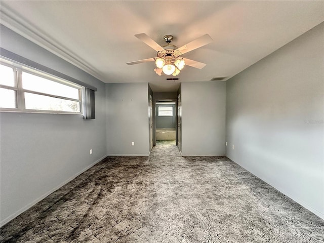 2020 W Snowy Egret Pl, Citrus Springs, FL 34434 - empty room with carpet flooring, a ceiling fan, and baseboards