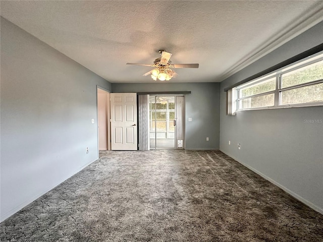 2020 W Snowy Egret Pl, Citrus Springs, FL 34434 - carpeted spare room featuring plenty of natural light, a ceiling fan, a textured ceiling, and baseboards