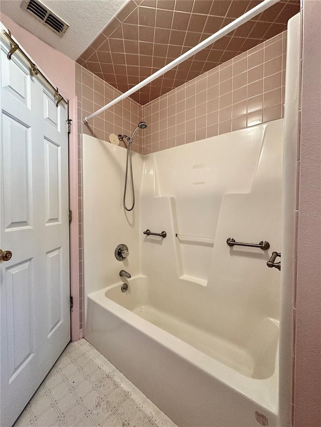 2020 W Snowy Egret Pl, Citrus Springs, FL 34434 - bathroom with tile patterned floors and bathtub / shower combination