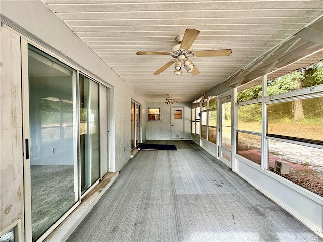 2020 W Snowy Egret Pl, Citrus Springs, FL 34434 - unfurnished sunroom featuring ceiling fan