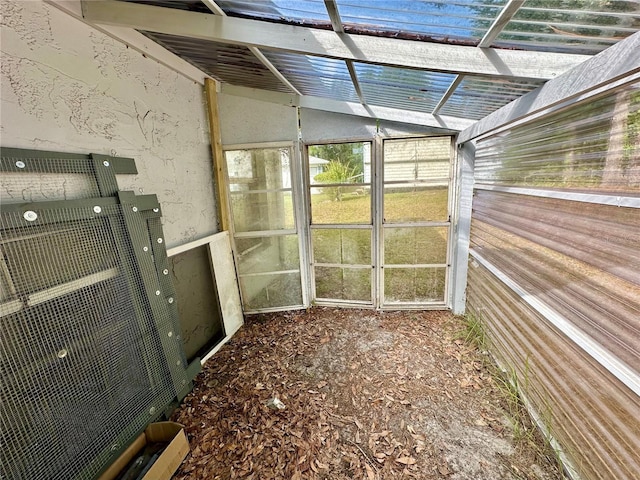 2020 W Snowy Egret Pl, Citrus Springs, FL 34434 - unfurnished sunroom featuring vaulted ceiling