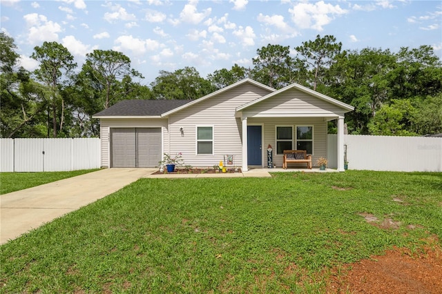 5063 SE 168th Ter, Ocklawaha, FL 32179 - single story home with an attached garage, driveway, and covered porch