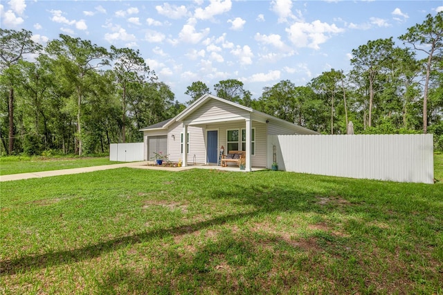 5063 SE 168th Ter, Ocklawaha, FL 32179 - ranch-style home with a garage and driveway
