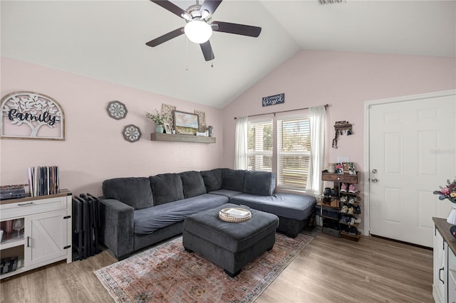 5063 SE 168th Ter, Ocklawaha, FL 32179 - living area with ceiling fan, lofted ceiling, and light wood-type flooring