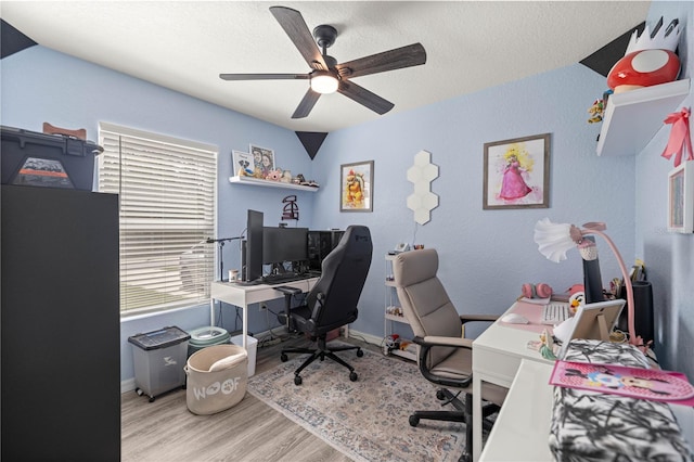 5063 SE 168th Ter, Ocklawaha, FL 32179 - office featuring wood finished floors, a ceiling fan, baseboards, and a textured ceiling