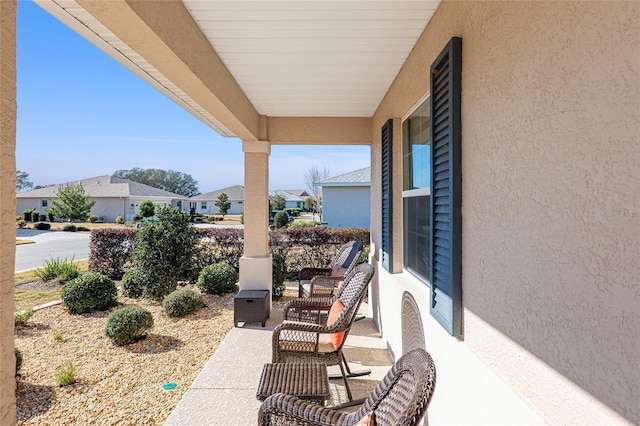 8878 SW 103rd Cir, Ocala, FL 34481 - view of patio / terrace featuring a residential view