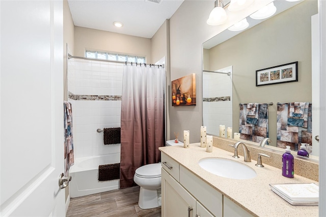 8878 SW 103rd Cir, Ocala, FL 34481 - bathroom featuring vanity, toilet, shower / bathtub combination with curtain, and wood finished floors