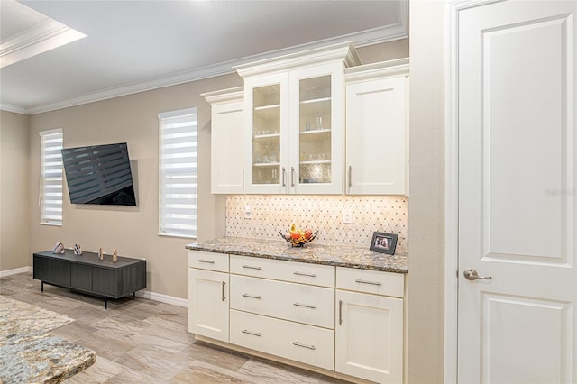8878 SW 103rd Cir, Ocala, FL 34481 - bar featuring ornamental molding, baseboards, healthy amount of natural light, and decorative backsplash