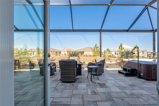 8878 SW 103rd Cir, Ocala, FL 34481 - view of patio featuring a hot tub and glass enclosure