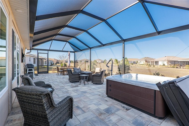8878 SW 103rd Cir, Ocala, FL 34481 - view of patio with a hot tub, outdoor dining space, a lanai, and a residential view