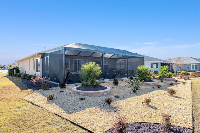 8878 SW 103rd Cir, Ocala, FL 34481 - rear view of property featuring a lanai
