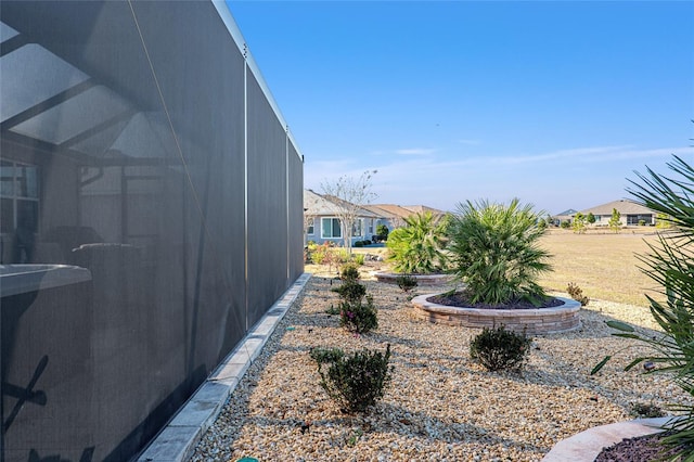 8878 SW 103rd Cir, Ocala, FL 34481 - view of yard featuring glass enclosure