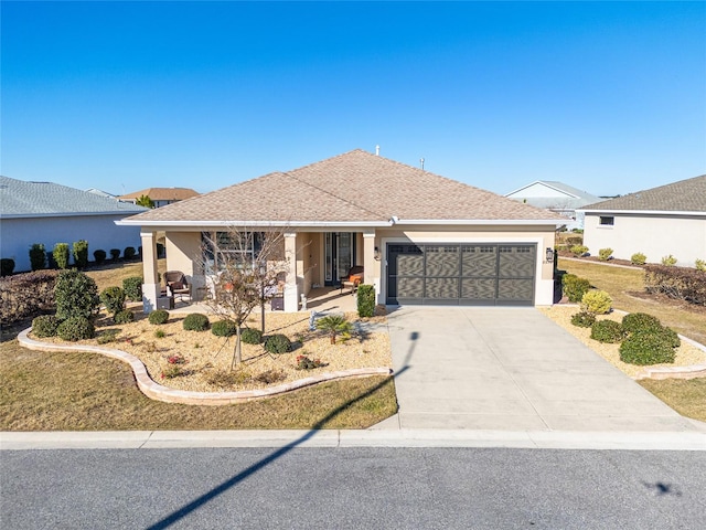 8878 SW 103rd Cir, Ocala, FL 34481 - ranch-style home featuring an attached garage, driveway, a porch, roof with shingles, and stucco siding