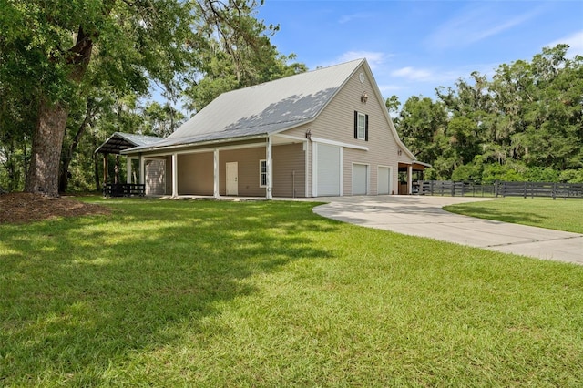 659 NW 155th Way, Newberry, FL 32669 - view of front of home featuring driveway and a metal roof