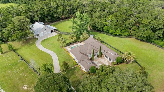 659 NW 155th Way, Newberry, FL 32669 - aerial view of property and surrounding area featuring a heavily wooded area
