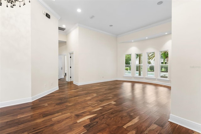 659 NW 155th Way, Newberry, FL 32669 - spare room with ornamental molding, wood finished floors, a high ceiling, and recessed lighting