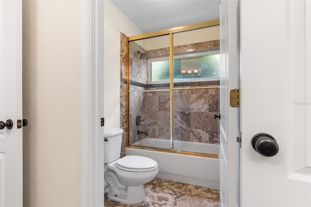 659 NW 155th Way, Newberry, FL 32669 - bathroom with toilet and enclosed tub / shower combo