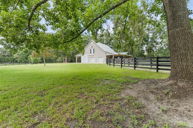 659 NW 155th Way, Newberry, FL 32669 - fenced backyard with an attached garage and view of scattered trees