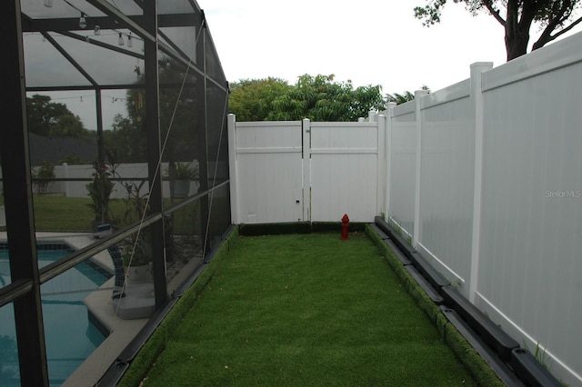 14126 Greater Pines Blvd, Clermont, FL 34711 - view of yard with glass enclosure