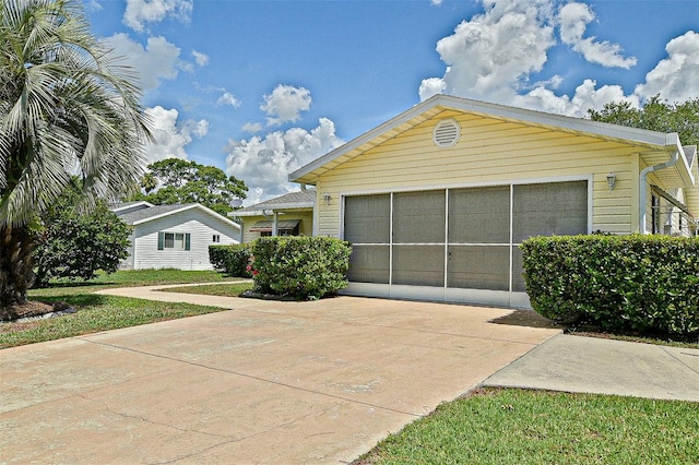 10699 SE 178th St, Summerfield, FL 34491 - view of front of home featuring concrete driveway