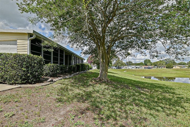 10699 SE 178th St, Summerfield, FL 34491 - view of green lawn featuring a water view