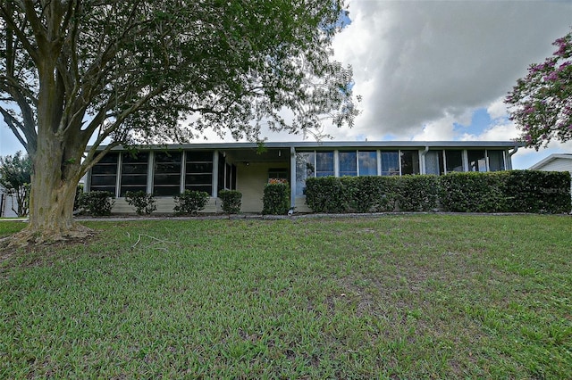 10699 SE 178th St, Summerfield, FL 34491 - single story home with a sunroom and a front lawn
