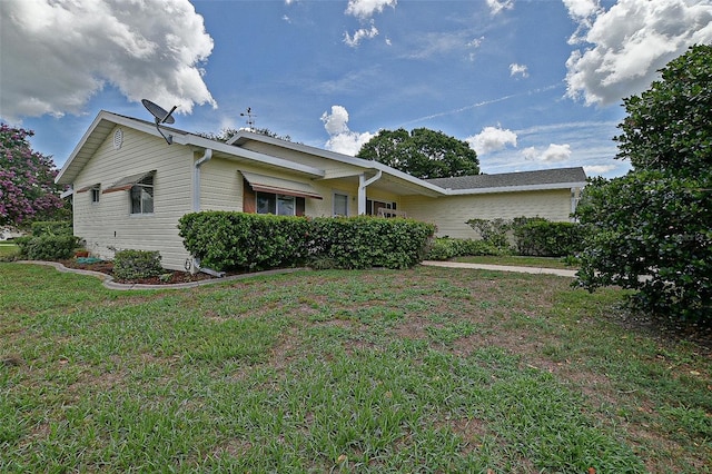 10699 SE 178th St, Summerfield, FL 34491 - view of side of home with a lawn