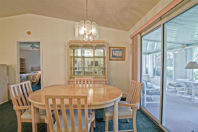 10699 SE 178th St, Summerfield, FL 34491 - carpeted dining area with vaulted ceiling, a textured ceiling, and a chandelier