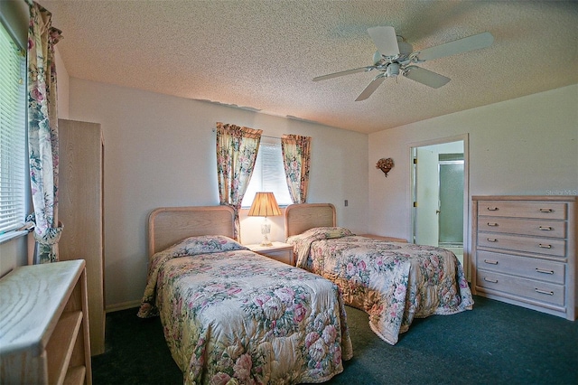 10699 SE 178th St, Summerfield, FL 34491 - bedroom featuring a textured ceiling, carpet flooring, and a ceiling fan