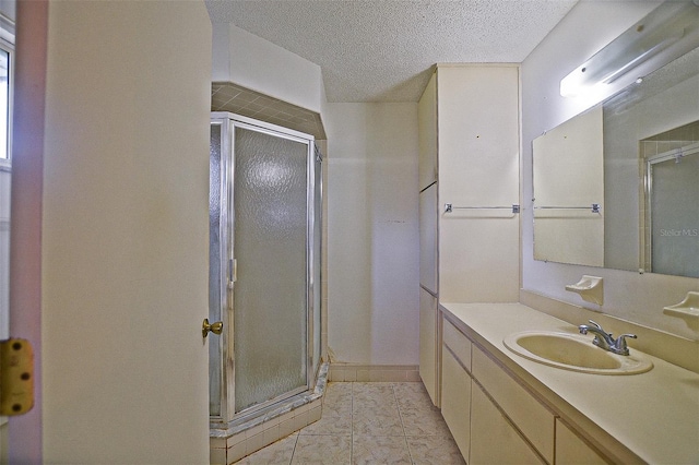 10699 SE 178th St, Summerfield, FL 34491 - bathroom with a shower stall, vanity, and a textured ceiling