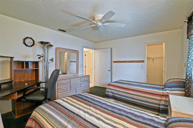 10699 SE 178th St, Summerfield, FL 34491 - bedroom with a textured ceiling, ceiling fan, and an office area