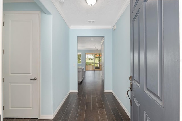 9805 SW 95th Loop, Ocala, FL 34481 - corridor featuring baseboards, a textured ceiling, dark wood-style floors, and crown molding